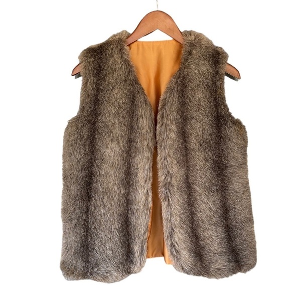 Jackets & Blazers - Vintage faux fur vest .
